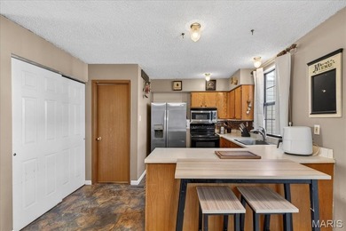 Welcome to Raintree Village Condominiums!  This 2-bedroom, 1 on Raintree Country Club in Missouri - for sale on GolfHomes.com, golf home, golf lot