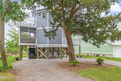 Discover your ideal canal front cottage right in time for on Founders Club At St. James Plantation in North Carolina - for sale on GolfHomes.com, golf home, golf lot