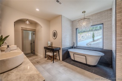 MOTIVATED SELLER! This stunning 5,500 sq ft home offers a blend on The Club At Porto Cima in Missouri - for sale on GolfHomes.com, golf home, golf lot
