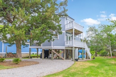 Discover your ideal canal front cottage right in time for on Founders Club At St. James Plantation in North Carolina - for sale on GolfHomes.com, golf home, golf lot