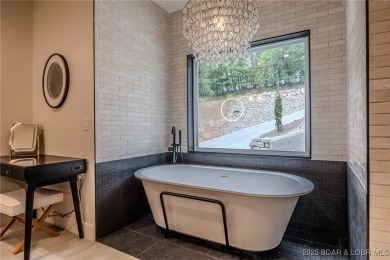 MOTIVATED SELLER! This stunning 5,500 sq ft home offers a blend on The Club At Porto Cima in Missouri - for sale on GolfHomes.com, golf home, golf lot