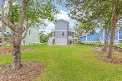 Discover your ideal canal front cottage right in time for on Founders Club At St. James Plantation in North Carolina - for sale on GolfHomes.com, golf home, golf lot