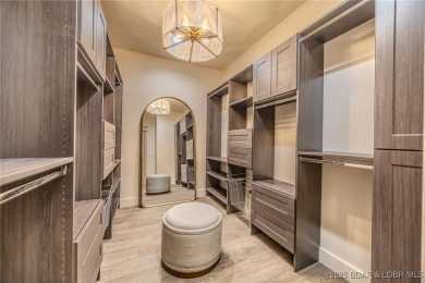 MOTIVATED SELLER! This stunning 5,500 sq ft home offers a blend on The Club At Porto Cima in Missouri - for sale on GolfHomes.com, golf home, golf lot