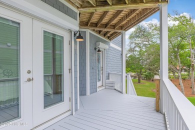 Discover your ideal canal front cottage right in time for on Founders Club At St. James Plantation in North Carolina - for sale on GolfHomes.com, golf home, golf lot