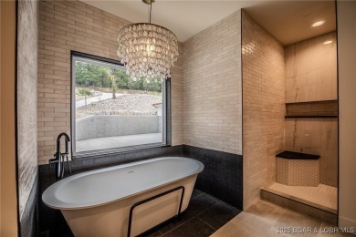 MOTIVATED SELLER! This stunning 5,500 sq ft home offers a blend on The Club At Porto Cima in Missouri - for sale on GolfHomes.com, golf home, golf lot