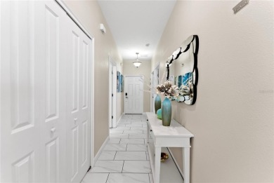 This townhome doesn't just check boxes -- it delivers the kind on The Oasis Club at Champions Gate in Florida - for sale on GolfHomes.com, golf home, golf lot