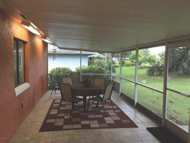 4 bedroom, 2 bath, 2 car garage home on the Sherwood Golf on Sherwood Golf Club in Florida - for sale on GolfHomes.com, golf home, golf lot