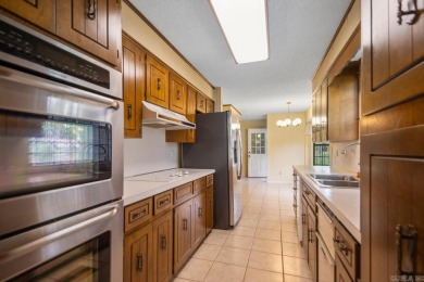 This well maintained 3-bedroom, 2.5-bath home offers tons of on Foxwood Golf Club in Arkansas - for sale on GolfHomes.com, golf home, golf lot