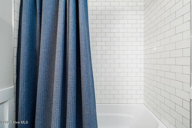 Experience island ownership in this beautifully situated Villa on Bald Head Island Golf Club in North Carolina - for sale on GolfHomes.com, golf home, golf lot