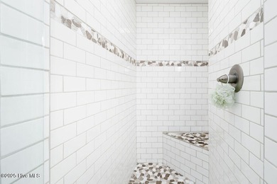 Experience island ownership in this beautifully situated Villa on Bald Head Island Golf Club in North Carolina - for sale on GolfHomes.com, golf home, golf lot