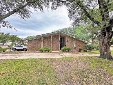 This large mid-century modern home has lots of great features on Athens Country Club in Texas - for sale on GolfHomes.com, golf home, golf lot