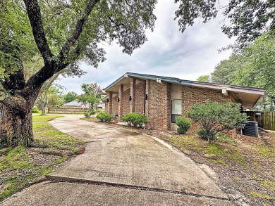 This large mid-century modern home has lots of great features on Athens Country Club in Texas - for sale on GolfHomes.com, golf home, golf lot