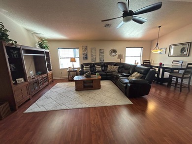 Foyer entry into the open living area with cathedral ceilings. A on Spanish Lakes Fairways in Florida - for sale on GolfHomes.com, golf home, golf lot