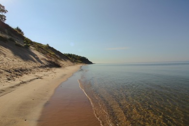 Embark on an extraordinary lifestyle at Lakeside Dunes on Muskegon Country Club in Michigan - for sale on GolfHomes.com, golf home, golf lot