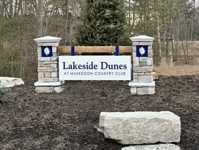 Embark on an extraordinary lifestyle at Lakeside Dunes on Muskegon Country Club in Michigan - for sale on GolfHomes.com, golf home, golf lot