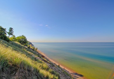 Embark on an extraordinary lifestyle at Lakeside Dunes on Muskegon Country Club in Michigan - for sale on GolfHomes.com, golf home, golf lot