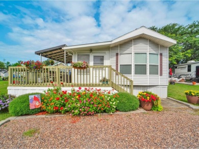 Welcome to this charming seasonal cottage in the beautiful Lake on Apple Island Golf Course At Apple Island Resort in Vermont - for sale on GolfHomes.com, golf home, golf lot