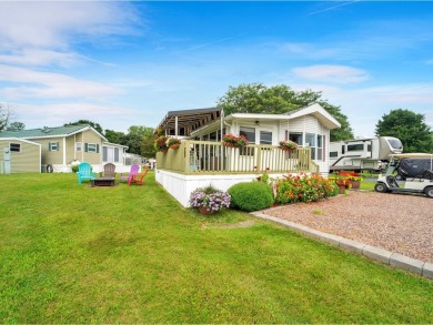 Welcome to this charming seasonal cottage in the beautiful Lake on Apple Island Golf Course At Apple Island Resort in Vermont - for sale on GolfHomes.com, golf home, golf lot