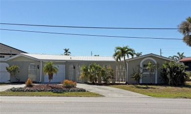 Spanish style WATERFRONT home located in desirable deed on Saint Andrews South Golf Club in Florida - for sale on GolfHomes.com, golf home, golf lot