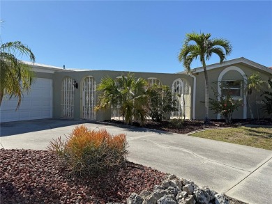 Spanish style WATERFRONT home located in desirable deed on Saint Andrews South Golf Club in Florida - for sale on GolfHomes.com, golf home, golf lot