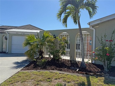 Spanish style WATERFRONT home located in desirable deed on Saint Andrews South Golf Club in Florida - for sale on GolfHomes.com, golf home, golf lot