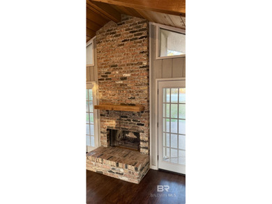 Live where the fairway meets home in this beautifully remodeled on Cypress Country Club and Golf Club  in Alabama - for sale on GolfHomes.com, golf home, golf lot