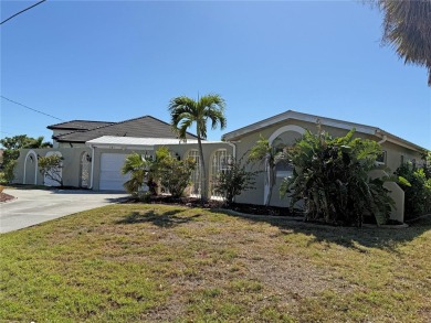 Spanish style WATERFRONT home located in desirable deed on Saint Andrews South Golf Club in Florida - for sale on GolfHomes.com, golf home, golf lot
