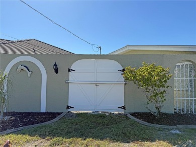 Spanish style WATERFRONT home located in desirable deed on Saint Andrews South Golf Club in Florida - for sale on GolfHomes.com, golf home, golf lot