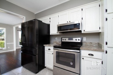 Live where the fairway meets home in this beautifully remodeled on Cypress Country Club and Golf Club  in Alabama - for sale on GolfHomes.com, golf home, golf lot