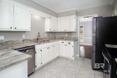 Live where the fairway meets home in this beautifully remodeled on Cypress Country Club and Golf Club  in Alabama - for sale on GolfHomes.com, golf home, golf lot