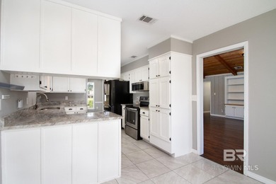 Live where the fairway meets home in this beautifully remodeled on Cypress Country Club and Golf Club  in Alabama - for sale on GolfHomes.com, golf home, golf lot