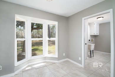 Live where the fairway meets home in this beautifully remodeled on Cypress Country Club and Golf Club  in Alabama - for sale on GolfHomes.com, golf home, golf lot