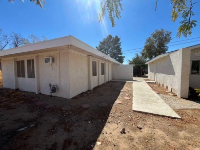 Remodeled 3 bedroom 2 bathroom house adjacent to Central Park on Tierra Del Sol Golf Course in California - for sale on GolfHomes.com, golf home, golf lot