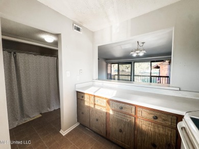 JUST REDUCED To SELL! 2 BEDROOM/ 2 BATH CONDO WITH AMAZING VIEWS on Diamondhead Country Club in Mississippi - for sale on GolfHomes.com, golf home, golf lot
