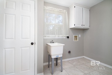 Live where the fairway meets home in this beautifully remodeled on Cypress Country Club and Golf Club  in Alabama - for sale on GolfHomes.com, golf home, golf lot