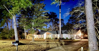 Live where the fairway meets home in this beautifully remodeled on Cypress Country Club and Golf Club  in Alabama - for sale on GolfHomes.com, golf home, golf lot