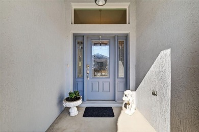 STUNNING, BLOCK and STUCCO 3/2 IRIS with GLASS ENCLOSED LANAI on Pennbrooke Fairways in Florida - for sale on GolfHomes.com, golf home, golf lot