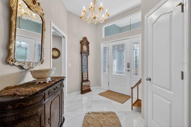 STUNNING, BLOCK and STUCCO 3/2 IRIS with GLASS ENCLOSED LANAI on Pennbrooke Fairways in Florida - for sale on GolfHomes.com, golf home, golf lot