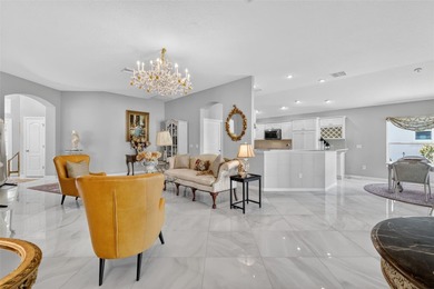 STUNNING, BLOCK and STUCCO 3/2 IRIS with GLASS ENCLOSED LANAI on Pennbrooke Fairways in Florida - for sale on GolfHomes.com, golf home, golf lot