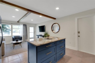 Welcome to this beautifully updated and fully furnished coastal on Key Royale Club in Florida - for sale on GolfHomes.com, golf home, golf lot