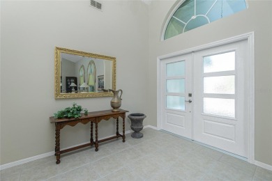 Stunning WATERFRONT pool home located on a quiet street in on Saint Andrews South Golf Club in Florida - for sale on GolfHomes.com, golf home, golf lot