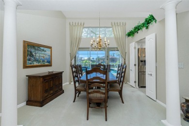 Stunning WATERFRONT pool home located on a quiet street in on Saint Andrews South Golf Club in Florida - for sale on GolfHomes.com, golf home, golf lot