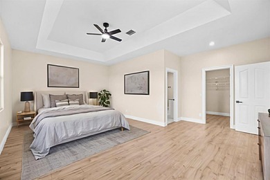 Reimagined and move-in ready, this waterfront home on an on The Legacy Golf and Tennis Club in Florida - for sale on GolfHomes.com, golf home, golf lot