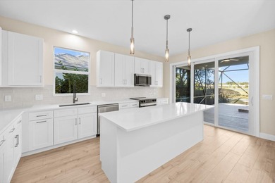 Reimagined and move-in ready, this waterfront home on an on The Legacy Golf and Tennis Club in Florida - for sale on GolfHomes.com, golf home, golf lot