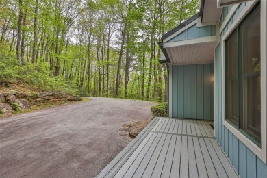 Nestled in the popular Holly Forest community of Sapphire, this on Sapphire National Golf Club in North Carolina - for sale on GolfHomes.com, golf home, golf lot