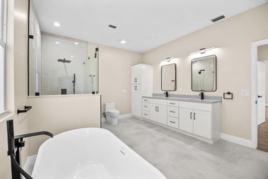 Reimagined and move-in ready, this waterfront home on an on The Legacy Golf and Tennis Club in Florida - for sale on GolfHomes.com, golf home, golf lot