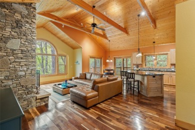 Nestled in the popular Holly Forest community of Sapphire, this on Sapphire National Golf Club in North Carolina - for sale on GolfHomes.com, golf home, golf lot