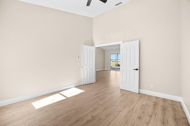 Reimagined and move-in ready, this waterfront home on an on The Legacy Golf and Tennis Club in Florida - for sale on GolfHomes.com, golf home, golf lot