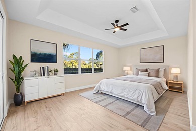 Reimagined and move-in ready, this waterfront home on an on The Legacy Golf and Tennis Club in Florida - for sale on GolfHomes.com, golf home, golf lot