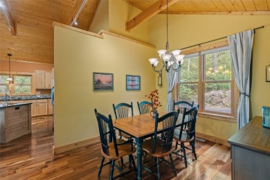 Nestled in the popular Holly Forest community of Sapphire, this on Sapphire National Golf Club in North Carolina - for sale on GolfHomes.com, golf home, golf lot